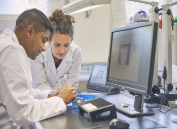 Two scientists working in a lab