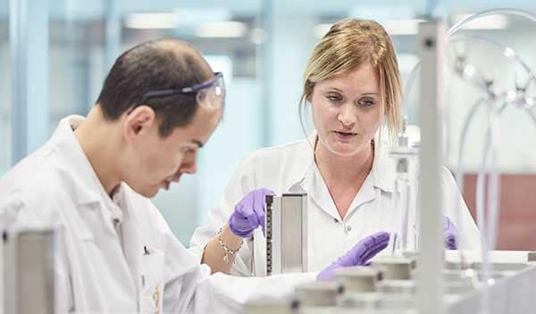 Two scientists working in a lab