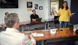 Woman giving presentation in a meeting room